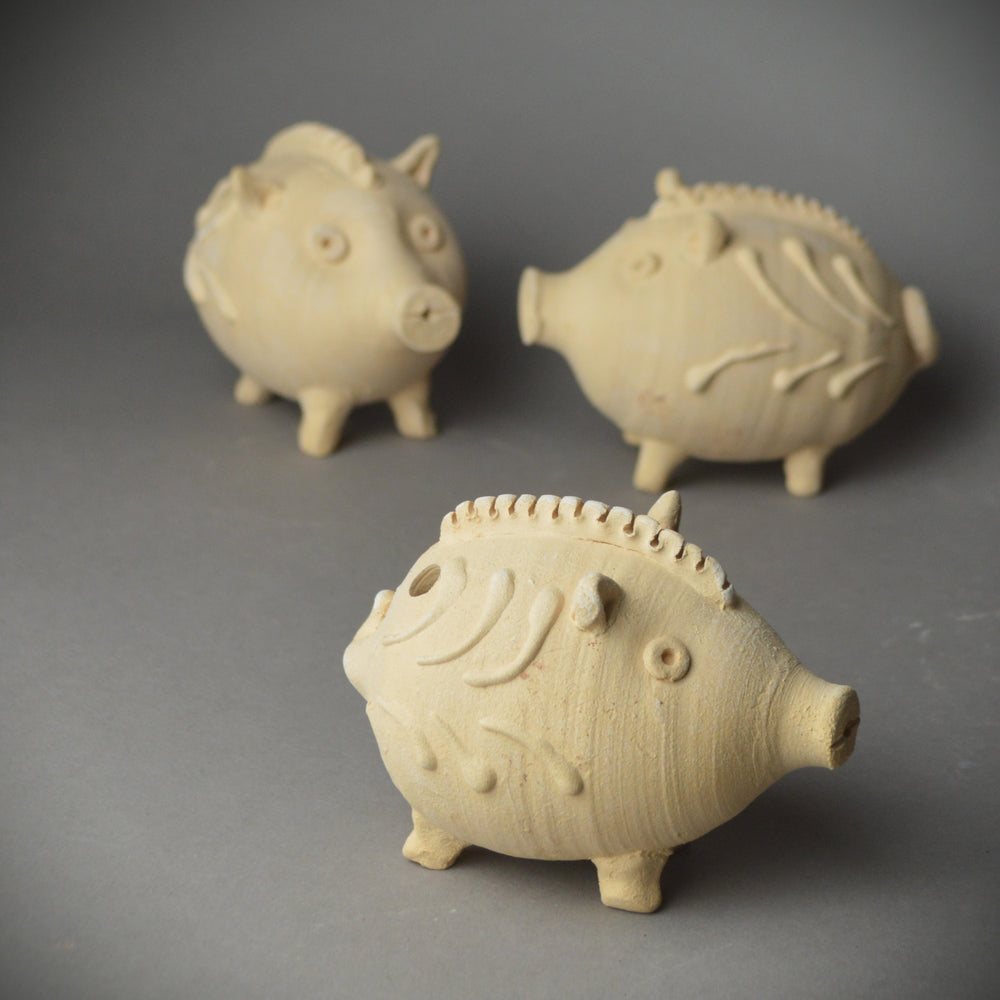 Roman Pig Rattle