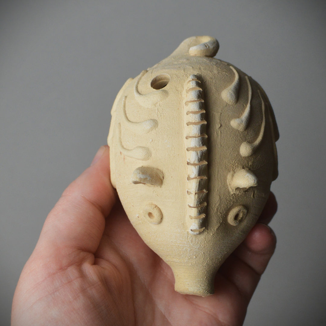 Roman Pig Rattle