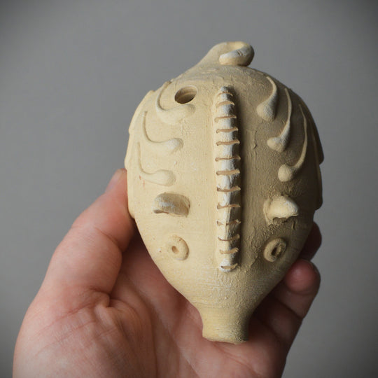 Roman Pig Rattle