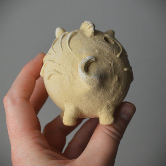 Roman Pig Rattle